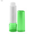 A lip balm stick with a white balm and a transparent green cap and base, featuring a logo.