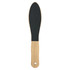 A wooden foot file featuring a black abrasive surface and a light wooden handle.