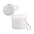A white Cloud Poncho packaged in a round container, featuring a clip for easy attachment.