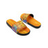 Brightly coloured slides featuring a vibrant orange design with peace signs and a graphic of a van. Black sole accents. Brightly coloured slides featuring a vibrant orange design with peace signs and a graphic of a van. Black sole accents.