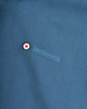 Lambretta Mens Showerproof Classic Harrington MOD Scooter Jacket Coat, close-up of the embroidered Lambretta logo and a circular MOD target emblem on a blue waterproof jacket.