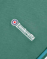 Lambretta Mens Casual Classic Twin Tipped MOD SKA Polo Shirt, close-up of the embroidered Lambretta logo on green fabric.