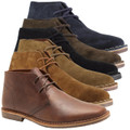 Thomas Crick Gobi Men's Classic Leather and Suede Ankle Desert Boots, arranged in a row showcasing different colors including brown, beige, black, and navy blue, with a lace-up design and rugged outsole.