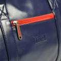 Lambretta Retro Classic Sports Messenger Shoulder Laptop Tablet Body Strap Bag, close-up of navy blue faux leather bag with red zipper pocket and metallic Lambretta zipper pull.