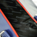 Lambretta Retro Classic Sports Messenger Shoulder Laptop Tablet Body Strap Bag, interior view showing black lining with Lambretta logo pattern.
