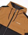 Lambretta Mens Contrast Panel Retro Zip Up Hooded Coat Jacket, close-up view showing tan and black color blocking, front zipper, black drawstrings, and Lambretta logo on chest.