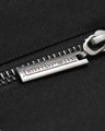 Lambretta Mens Contrast Panel Retro Zip Up Hooded Coat Jacket, close-up of zipper with Lambretta branding on a black fabric background.