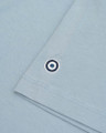 Lambretta Mens Classic Retro Two Tone Panel Mod Ska T-Shirt, close-up of light blue fabric with a small circular embroidered emblem.