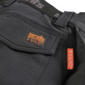 Scruffs Tech Holster Mens Multi Pocket Workwear Trousers, close-up view of the black work trousers showing the brand label and fabric details.