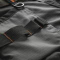 Scruffs Trade Flex Mens Pockets Cargo Shorts, close-up image showing durable fabric, multiple pockets, and adjustable strap for versatile workwear.
