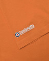 Lambretta Mens Fade Racing Stripe Retro Mod Ska Casual T-Shirts, close-up of orange t-shirt with Lambretta embroidered logo near sleeve.