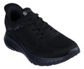 Skechers Bobs Squad Chaos Solid Step Mens Slip-Ins Casual Trainers, black athletic shoe with a breathable mesh upper and cushioned sole.
