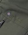 Lambretta Mens Utility Hooded Quilted Classic Badged Parka, close-up of olive green quilted fabric with embroidered Lambretta logo and zipper detail.
