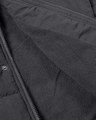 Lambretta Mens Padded Hooded Classic Badge Parka, close-up view of the black insulated jacket fabric showing the fleece lining and zippered pocket.