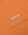 Lambretta Mens MOD Target Design Smart Classic Retro T-Shirt, close-up of the orange t-shirt fabric with embroidered Lambretta logo and MOD target design.