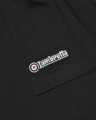 Lambretta Mens Paisley Target Logo Smart Classic Retro T-Shirt, close-up of black fabric with embroidered Lambretta logo featuring target design in white, red, and blue.