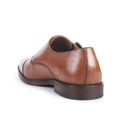 Thomas Crick Aubry Mens Monk Buckle Smart Casual Suede Shoes, a brown leather dress shoe with a monk buckle and smooth finish, featuring a rounded toe and a sturdy low heel.