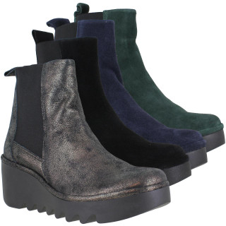 Fly London Bagu Women's Classic Wedge Heeled Pull-On Ankle Boots, fashion-forward ankle boots in metallic, black, navy, and green suede finishes with wedge heels.