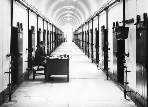 Guard Sitting at Desk Postcard