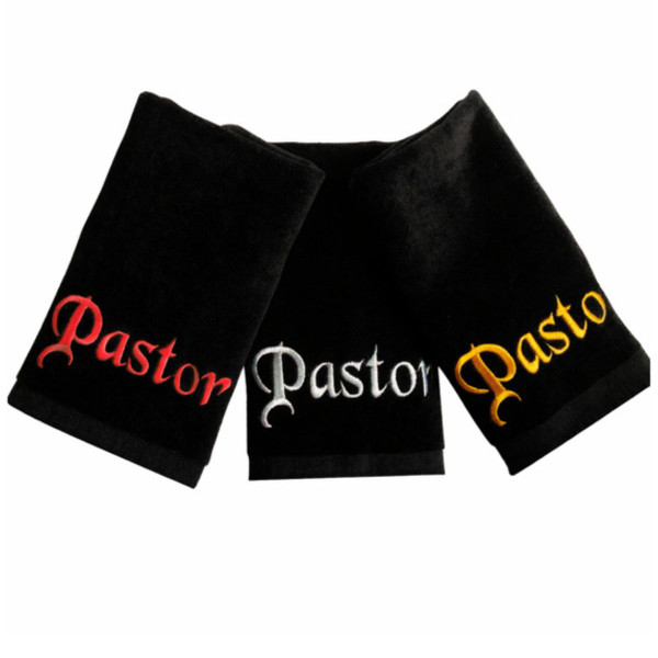 Black embroidered pastor towels with ministry titles displayed for clergy and church use