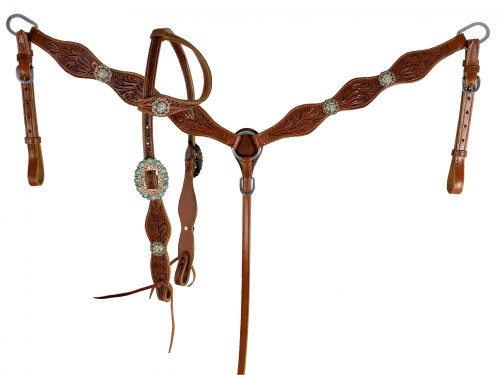 Showman ® Medium oil one ear leather headstall and breast collar set with floral tooling and silver conchos. This set is medium oil in color with medium brown floral tooling and accented with silver and turquoise conchos. Comes complete with 7ft reins.