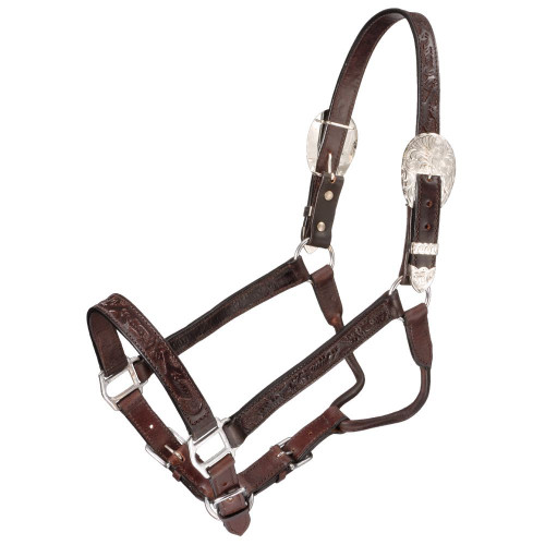 Quality leather show halter perfect for your horse’s next halter or showmanship class.

This halter is expertly crafted with intricate leather tooled nose, cheek, and crown pieces.

The large, engraved crown buckles, tips, and keepers pop against the dark oil leather.

Complete with adjustable nose to fit most horses and 5 foot leather lead with chain.

Quality leather construction
Tooled nose, cheeks, and crown
Large silver buckles with matching tips and keepers
Adjustable at nose to fit most horses
Great for halter or showmanship
Includes leather lead rope

Cheeks: 8" long, Nose (adjustable): 10 1/2" x 1", 5' lead

Great for ranch shows where they prefer minimal silver.