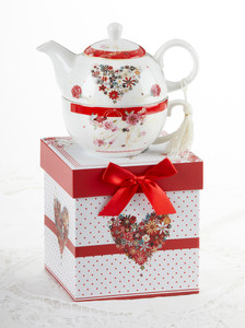 Floral Heart Tea for one set in gift box, will brighten anyone's day with this beautiful tea for one gift set in its own matching print gift box with matching satin ribbon. A decorative tassel on the handle adds a lovely touch. Gifting Idea: birthday gift, bridal shower, get well, thank you or treat yourself. Holds enough for a refill without leaving your comfy spot, desk or sip at beside for an evening nightcap.   Includes:  5.8" Tea for One Set in gift box Stacked teapot and oversized teacup Soft white background with a red foral print Dishwasher safe  Other Items Available:  Tea choices available to add to your order in the loose-leaf shop   Teas and Teaware are shipped together, Cornucopia Teas come in resealable pouches with decorative tea labels, and includes a brewing guide. If purchasing as a gift your personal message is included on the gift card Floral Heart Tea for one set in gift box, will brighten anyone's day with this beautiful tea for one gift set in its own matching print gift box with matching satin ribbon. A decorative tassel on the handle adds a lovely touch. Gifting Idea: birthday gift, bridal shower, get well, thank you or treat yourself. Holds enough for a refill without leaving your comfy spot, desk or sip at beside for an evening nightcap.   Includes:  5.8" Tea for One Set in gift box Stacked teapot and oversized teacup Soft white background with a red foral print Dishwasher safe  Other Items Available:  Tea choices available to add to your order in the loose-leaf shop   Teas and Teaware are shipped together, Cornucopia Teas come in resealable pouches with decorative tea labels, and includes a brewing guide. If purchasing as a gift your personal message is included on the gift card