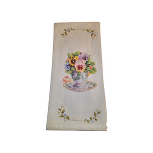 Tea Towel - Pansy Cup: Soft 100% cotton large white flour sack tea towel Carol Wilson designs. This tea towel by Carol Wilson Designs (American owned and American based) goes with any kitchen or table setting for afternoon tea. Matches many of our teaware and tea sets and can be found in many of our tea line boxed gift sets. Care instructions: Machine washable gentle cycle, color safe bleach only when needed. Tea Towel - Pansy Cup: Soft 100% cotton large white flour sack tea towel Carol Wilson designs. This tea towel by Carol Wilson Designs (American owned and American based) goes with any kitchen or table setting for afternoon tea. Matches many of our teaware and tea sets and can be found in many of our tea line boxed gift sets. Care instructions: Machine washable gentle cycle, color safe bleach only when needed.