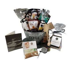 Father's Day Gourmet Coffee & Tea - Pod Holder Gift Basket: A perfect gift for Dad. This Coffee Pod holder holds up to 24 coffee pods after these goodies are gone. Filled with a selection of Cornucopia's Gourmet Coffee beans, Decaffeinated Gourmet Coffee Beans, and Cafe Latte Tea which is a mix of coffee beans, black tea, and chocolate! The rich decoration of creamy yoghurt pieces, a hint of cocoa, delicious, sweet chocolate, and coffee beans from our own roaster, all support the taste variety of this exquisite and unique mixture! Spicy Chai Sugar, use in tea or coffee, tea accessories for loose leaf tea making, and a selection of complimentary goodies to go with either brew they choose. Includes: • Coffee Pod Counter Container - metal container shaped like a coffee cup with the word COFFEE on the front. • 1 oz. Cornucopia's Gourmet whole coffee beans, rich full roast, • 1 oz Cornucopia's Gourmet Decaffeinated whole coffee beans, • 1 oz of Cornucopia Shop's Organic Loose-Leaf tea 8T22441 Cafe Latte, o Black tea (74 %), broken cocoa bits, brittle pieces (sugar, hazelnuts, invert sugar), Jumbo chocolate chips (sugar, ground cocoa beans with cocoa butter, cocoa powder, emulsifier: Soja lecithin), flavoring, coffee beans, freeze-dried yoghurt granules (skimmed milk yogurt, sugar, maltodextrin, modified starch, acidifying agent: citric acid) • 1 oz Spicy Chai Sugar, • Tea ball infuser 1 1/2 " stainless steel by Chai Cult made in Germany SKU 41519, • Mini Honey 1 oz, • Wood Honey Spool, • 1.76 oz Marich Ginger Bites, • 1.4 oz Dad's Special Day! Spiced Sugar Cookie Bites • 2 oz Best Dad Ever! Chocolate Chip Cookie Bites. Gift is wrapped in cellophane and tied with handmade bow. Father's Day Enclosure card with 10% off coupon on purchase of tea, and your personal gift message. Father's Day Gourmet Coffee & Tea - Pod Holder Gift Basket: A perfect gift for Dad. This Coffee Pod holder holds up to 24 coffee pods after these goodies are gone. Filled with a selection of Cornucopia's Gourmet Coffee beans, Decaffeinated Gourmet Coffee Beans, and Cafe Latte Tea which is a mix of coffee beans, black tea, and chocolate! The rich decoration of creamy yoghurt pieces, a hint of cocoa, delicious, sweet chocolate, and coffee beans from our own roaster, all support the taste variety of this exquisite and unique mixture! Spicy Chai Sugar, use in tea or coffee, tea accessories for loose leaf tea making, and a selection of complimentary goodies to go with either brew they choose. Includes: • Coffee Pod Counter Container - metal container shaped like a coffee cup with the word COFFEE on the front. • 1 oz. Cornucopia's Gourmet whole coffee beans, rich full roast, • 1 oz Cornucopia's Gourmet Decaffeinated whole coffee beans, • 1 oz of Cornucopia Shop's Organic Loose-Leaf tea 8T22441 Cafe Latte, o Black tea (74 %), broken cocoa bits, brittle pieces (sugar, hazelnuts, invert sugar), Jumbo chocolate chips (sugar, ground cocoa beans with cocoa butter, cocoa powder, emulsifier: Soja lecithin), flavoring, coffee beans, freeze-dried yoghurt granules (skimmed milk yogurt, sugar, maltodextrin, modified starch, acidifying agent: citric acid) • 1 oz Spicy Chai Sugar, • Tea ball infuser 1 1/2 " stainless steel by Chai Cult made in Germany SKU 41519, • Mini Honey 1 oz, • Wood Honey Spool, • 1.76 oz Marich Ginger Bites, • 1.4 oz Dad's Special Day! Spiced Sugar Cookie Bites • 2 oz Best Dad Ever! Chocolate Chip Cookie Bites. Gift is wrapped in cellophane and tied with handmade bow. Father's Day Enclosure card with 10% off coupon on purchase of tea, and your personal gift message.