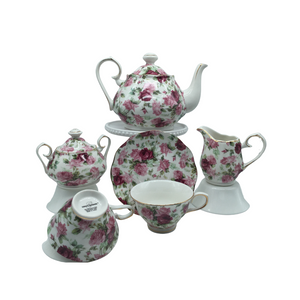 Grace Teaware Summer Rose Chintz Bouquet Tea Set Gift Boxed 11pc porcelain Grace Tea set in a Rose chintz with white background with gold trim. Beautiful and easy to incorporate into any table decor. Complete service for 4. Teapot holds 5 cups. Matching cream and sugar bowl. To be enjoyed for years to come. Gifting Idea: birthday, bridal shower, or Mother's Day. treat yourself or someone you love! Includes: 11 pc porcelain tea set by Grace Teaware 1- 5 cup Teapot 4 - cup/saucer set 1 - Cream/sugar set White background with rose chintz print on white background, gold trim. Dishwasher safe Enclosure card included. Grace Teaware Summer Rose Chintz Bouquet Tea Set Gift Boxed 11pc porcelain Grace Tea set in a Rose chintz with white background with gold trim. Beautiful and easy to incorporate into any table decor. Complete service for 4. Teapot holds 5 cups. Matching cream and sugar bowl. To be enjoyed for years to come. Gifting Idea: birthday, bridal shower, or Mother's Day. treat yourself or someone you love! Includes: 11 pc porcelain tea set by Grace Teaware 1- 5 cup Teapot 4 - cup/saucer set 1 - Cream/sugar set White background with rose chintz print on white background, gold trim. Dishwasher safe Enclosure card included.