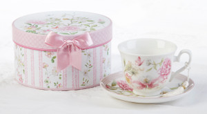 Poppyseed Cup/Saucer in Gift Box Cup/Saucer in gift box, will brighten anyone's day in its own matching print gift box with matching satin ribbon. A decorative tassel on the handle adds a lovely finishing touch. Gifting Idea: birthday gift, bridal shower, get well, treat yourself or someone you love. Includes: 3.5" Cup/Saucer in gift box Soft white background with pastel floral print Dishwasher safe Other Items Available: Matching Teapot available D8141-2 Tea choices available to add to your order in the loose-leaf shop Teas and Teaware are shipped together, Cornucopia Teas come in resealable pouches with decorative tea labels, and includes a recipe and brewing guide. If purchasing as a gift your personal message is included on the pamphlet. Poppyseed Cup/Saucer in Gift Box Cup/Saucer in gift box, will brighten anyone's day in its own matching print gift box with matching satin ribbon. A decorative tassel on the handle adds a lovely finishing touch. Gifting Idea: birthday gift, bridal shower, get well, treat yourself or someone you love. Includes: 3.5" Cup/Saucer in gift box Soft white background with pastel floral print Dishwasher safe Other Items Available: Matching Teapot available D8141-2 Tea choices available to add to your order in the loose-leaf shop Teas and Teaware are shipped together, Cornucopia Teas come in resealable pouches with decorative tea labels, and includes a recipe and brewing guide. If purchasing as a gift your personal message is included on the pamphlet.