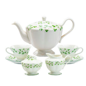 Clover Vine Porcelain Tea/Coffee Service Set: Fine porcelain 8pc tea set with, 1 Tea/Coffee Pot, and 2 Sets of Cup & Saucer, 1 set cream/sugar. in a classic clover vine print. Perfect for St. Patrick's Day. Includes: 8pc (includes lids) Porcelain tea/coffee services set 1- 5 cup tea/coffee pot 2 - cup/saucer set 1- cream/sugar set Dishwasher safe Complimentary Enclosure Card Clover Vine Porcelain Tea/Coffee Service Set: Fine porcelain 8pc tea set with, 1 Tea/Coffee Pot, and 2 Sets of Cup & Saucer, 1 set cream/sugar. in a classic clover vine print. Perfect for St. Patrick's Day. Includes: 8pc (includes lids) Porcelain tea/coffee services set 1- 5 cup tea/coffee pot 2 - cup/saucer set 1- cream/sugar set Dishwasher safe Complimentary Enclosure Card