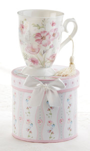 Poppyseed Mug in Gift Box, will brighten anyone's day in its own matching print gift box with matching satin ribbon. A decorative tassel on the handle adds a lovely finishing touch. Gifting Idea: birthday gift, bridal shower, get well, treat yourself or someone you love. Includes: 4.6" Mug in gift box Dishwasher safe Poppyseed Mug in Gift Box, will brighten anyone's day in its own matching print gift box with matching satin ribbon. A decorative tassel on the handle adds a lovely finishing touch. Gifting Idea: birthday gift, bridal shower, get well, treat yourself or someone you love. Includes: 4.6" Mug in gift box Dishwasher safe