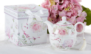 Moon Rose Tea for One in Gift Box, will brighten anyone's day with this beautiful tea for one gift set in its own matching print gift box with matching satin ribbon. A decorative tassel on the handle adds a lovely finishing touch. Gifting Idea: birthday gift, bridal shower, get well, thank you or treat yourself. Holds enough for a refill without leaving your comfy spot, desk or sip at beside for an evening nightcap.
Includes:
5.8" Tea for One Set in gift box
Stacked teapot and oversized teacup
Soft white background with a Moon Rose Print
Dishwasher safe Moon Rose Tea for One in Gift Box, will brighten anyone's day with this beautiful tea for one gift set in its own matching print gift box with matching satin ribbon. A decorative tassel on the handle adds a lovely finishing touch. Gifting Idea: birthday gift, bridal shower, get well, thank you or treat yourself. Holds enough for a refill without leaving your comfy spot, desk or sip at beside for an evening nightcap.
Includes:
5.8" Tea for One Set in gift box
Stacked teapot and oversized teacup
Soft white background with a Moon Rose Print
Dishwasher safe
