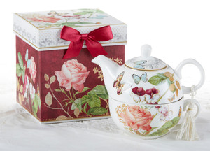 Burgandy Peony Tea for One in Gift Box, will brighten anyone's day with this beautiful tea for one gift set in its own matching print gift box with matching satin ribbon. A decorative tassel on the handle adds a lovely finishing touch. Gifting Idea: birthday gift, bridal shower, get well, thank you or treat yourself. Holds enough for a refill without leaving your comfy spot, desk or sip at beside for an evening nightcap.
Includes:
5.8" Tea for One Set in gift box
Stacked teapot and oversized teacup
Soft white background with a Burgandy Peony Print
Dishwasher safe Burgandy Peony Tea for One in Gift Box, will brighten anyone's day with this beautiful tea for one gift set in its own matching print gift box with matching satin ribbon. A decorative tassel on the handle adds a lovely finishing touch. Gifting Idea: birthday gift, bridal shower, get well, thank you or treat yourself. Holds enough for a refill without leaving your comfy spot, desk or sip at beside for an evening nightcap.
Includes:
5.8" Tea for One Set in gift box
Stacked teapot and oversized teacup
Soft white background with a Burgandy Peony Print
Dishwasher safe