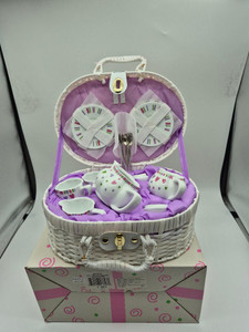 Toy Porcelain Tea Set in Basket- Multi- Heart: It's a tea party set for two!  Little Multi-Heart print tea set in a white picnic basket chest with pink check cloth liner. Perfect activity set for any little girl. ages 8+

1-Teapot,
2-Cup and Saucer,
2-Serving plates,
2 each, Spoon and Fork,
1-Storage Picnic basket.

This set is part of the Cornucopia's Toy Tea party set and comes with additional add ons:

Perfect tea party companion doll by Apple Dumpling Dolls
1 oz (12 tea parties or more) Children's Tea available
There is hardly another fruit on this planet which is as popular among young and old as the strawberry. We are, therefore, presenting our decaffeinated, flavored green tea variation. Its mild and, at the same time, intense taste is due to a natural strawberry flavoring, which shines when interacting with the soft tea basis. Ingredients: decaffeinated green tea, freeze-dried strawberry pieces, natural flavoring type strawberry.
All choices are shipped together in one box.
Gift card enclosure