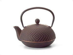 Iron Teapot “Li”
black-golden, with relief,
enameled inside,
stainless steel strainer,
content 3 cups
(23.7 fl. oz. / 0.7 l)
made in China

To clean, rinse with warm water and hand dry.  Not dishwasher safe.  Not for stove top or microwave use.