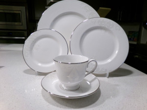 5 Piece Place Setting
Opal Innocence Scroll
by LENOX
Description: Taupe Floral Scrolls, Platinum Trim
Pattern: Opal Innocence Scroll by Lenox
Status: Discontinued. Actual: 2008 - 2020
Set Pieces
1 - Footed Cup & Saucer Set - 3 1/8 in
1 - Dinner Plate - 10 7/8 in
1 - Salad Plate - 8 1/4 in
1 - Bread & Butter Plate - 6 3/8 in