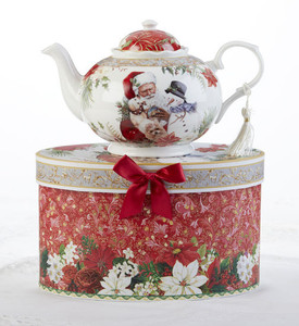 Santa Teapot in gift box, a beautiful Christmas teapot gift in its own matching print gift box with coordinating satin ribbon. A decorative tassel on the handle adds a lovely finishing touch. To be enjoyed throughout the holiday season, makes a lovely gift for that special Tea drinker on your gift list. Add one of Cornucopia's Loose Leaf Christmas Tea blends to finnish off this special holiday gift. Includes: 9.5 x 5.6" teapot Soft white with a Christmas floral print background with Santa and his friends Dishwasher safe Santa Teapot in gift box, a beautiful Christmas teapot gift in its own matching print gift box with coordinating satin ribbon. A decorative tassel on the handle adds a lovely finishing touch. To be enjoyed throughout the holiday season, makes a lovely gift for that special Tea drinker on your gift list. Add one of Cornucopia's Loose Leaf Christmas Tea blends to finnish off this special holiday gift. Includes: 9.5 x 5.6" teapot Soft white with a Christmas floral print background with Santa and his friends Dishwasher safe