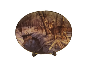 Collection Plate -Winter's Calm Woodland Tranquility porcelain plate collection Deer in a winter wood setting. Artist: Greg Alexander , Signed limited addition Certificate of Authenticity by the Bradford Exchange Porcelain with 23K gold trim on rim and numbered Collection Plate -Winter's Calm Woodland Tranquility porcelain plate collection Deer in a winter wood setting. Artist: Greg Alexander , Signed limited addition Certificate of Authenticity by the Bradford Exchange Porcelain with 23K gold trim on rim and numbered