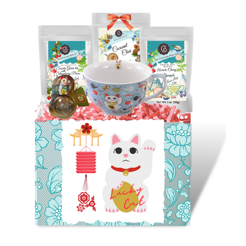 Lucky Cat Jumbo Cup - Gift boxed Set: a jumbo cup 11.5 oz, perfect for tea lover, latte drinkers or cappuccino lovers, soup cup. A matching Lucky Cat Tea ball Charm infuser.  3-1 oz Cornucopia Teas they love.   Gift Suggestions: anytime you would like to send good luck wishes.  The Lucky Cat Symbol is commonly used to bring happiness, good luck, success, and wealth.   Gift Set Includes:  Jumbo "Lucky Cat " 11.5 oz - by Cha Cult, Matching Lucky Cat 2" stainless steel Tea ball infuser by Cha Cult (Germany),   3-1 oz of Loose-Leaf Cornucopia Teas:  Sencha Green Tea with Strawberry Pieces’ Coconut Chai, Green Tea Cherry with Pineapple.  Gift Basket Box with paper shred fill, Lucky Cat box front gift card with your personal message on the flip side.  Cellophane wrapped with a hand tied bow.