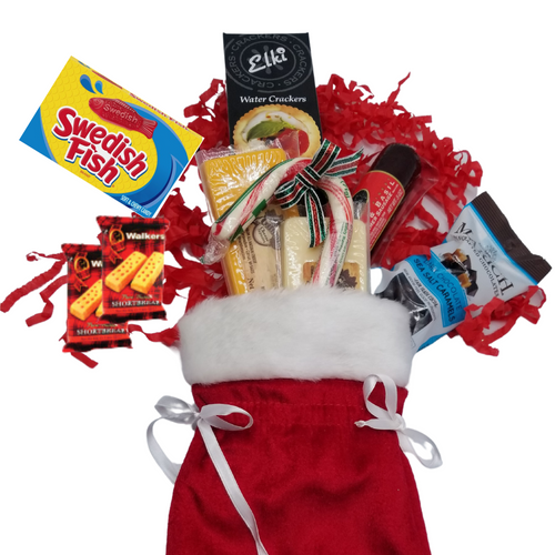 Stocking Stuffers Delight- Gift pack:  An exceptional gourmet Stocking of treats they'll enjoy this holiday season, filled with a selection of our finest meat and cheese, crackers, and candy in a red velvet white fur trimmed holiday bag.    1 Christmas Stocking bag, faux velvet capped with a white fur trim, with satin ribbon draw strings. 6" x 10" 3.1 oz Swedish Fish -traditional flavor, 4 oz Gilman's Swiss Cheese Bar,  4 oz Gilman's Cheddar Cheese Bar,  2.2 oz Elki Water Crackers,  2.3 oz. - Marich Dark Chocolate Sea Salt Cashews - Single Serve 2 Walker's Shortbread Fingers, 2 pack ea.,  5 oz Tomato Basil Sausage by Smoky Valley Gourmet, 1 Jumbo Peppermint Candy Cane.  Gift comes in a cello bag with Christmas bow, complimentary Enclosure Card with your personal message.
