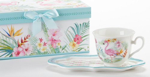 Flamingo Tea and Toast Set in Gift Box:  Enjoy your morning breakfast or afternoon tea and snack on this pretty set.  A pleasant way to create a moment of indulgence. Add one of our specialty loose leaf teas and cuddle up with a good book, sounds invigting to whisk your cares away. Meant for everyday use.  Comes in its own matching print gift box with matching satin ribbon. Great Gift Idea: New Mommy, Birthday, get well, thank you.    Includes:  4.2" x 9"  tray Porcelain Teacup  Soft white background with pink Flamingo tropical print in pink green yellow and blue floral print Dishwasher safe  Other Items Available:  Gift Set, Pamper me Gift Box: wonderful for New Mom, Bridal, Specail someone see SKU: GSD97421 Tea choices available to add to your order in the loose-leaf shop  Teas and Teaware are shipped together, Cornucopia Teas come in resealable pouches with decorative tea labels, and includes a recipe and brewing guide. If purchasing as a gift your personal message is included on the pamphlet.