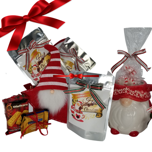Santa Gnome Mug & Hot Chocolate Stocking - Gift Basket: The perfect stocking for someone on your list, includes a Ceramic Santa Gnome Mug and matching Santa Gnome Gift Stocking felt bag, filled with our delicious Cornucopia Gourmet Hot Chocolate mixes, Candy Cane Peppermint Candies, Walkers Shortbread Cookies.   Includes:  Felt Santa Gnome stocking bag with handle,  Santa Gnome Ceramic Mug, 3 pc Ghirardelli assorted chocolates, milk, dark, caramel, 3, 1 oz Gourmet Hot Chocolate Mixes by the Cornucopia Shop  Marshmallow Snowballs Gourmet Chocolate Peppermint Kiss 2 oz Candy Cane Peppermint Hard Candy  Walkers Shortbread Finger Cookie, 2 piece pack  Gift comes wrapped in cellophane with hand tied plaid bow, a complimentary enclosure card with your personal message