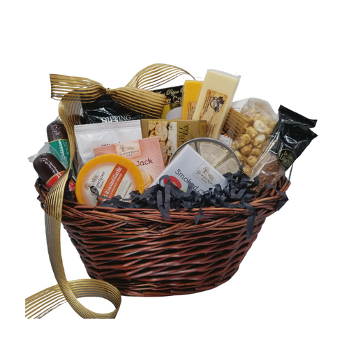 Any Occasion Gourmet Food Gift Basket: From Cornucopia’s Epicure Shop, a showcase of gourmet specialties and gifts ideal for a grand impression appropriate for any occasion. An array of shelf-stable, cheeses, Summer Sausage, Gourmet Crackers, Pretzels, Popcorn, Biscotti. Simply gourmet, simply delicious gift.     Gift giving ideas. Sympathy, Wedding, Anniversary, Thank you, with our complimentary gift card you can personalize this basket to fit any celebration or occasion you need.     11 " Dark Willow-Stained Basket with dropdown handle, 3 - 5 oz Summer Sausage Roasted Garlic Beef Tomato Basil 4 oz Brie Cheese Wheel, 1 oz Glacier Ridge Pepper Jack Cheese Spread, 1 oz Glacier Ridge Smoked Gouda Cheese Spread, 8 oz. - Glacier Ridge - Smoked Garlic Cheese Rounds,  4 oz Gilman’s Cheddar Stick,  4 oz Gilman’s Swiss Cheese, 2 boxes 1 oz Gourmet Black Pepper Cracker, Pretzels by East Shore Pretzel Co., 4 oz bag Dipping 2 oz bag Seasoned 6 oz Gourmet Popcorn, Caramel Vanilla,  2 pc Single Serve Biscotti, Java Bean Cookies & Cream  Gift comes wrapped in cellophane with hand tied bow that suites your occasion. A complimentary enclosure card with your personal message.