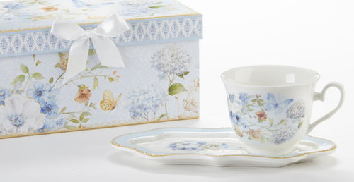 Blue Butterfly Tea and Toast Set in gift box:  Enjoy your morning breakfast or afternoon tea and snack on this pretty set.  A pleasant way to create a moment of indulgence. Add one of our specialty loose leaf teas and cuddle up with a good book, sounds invigting to whisk your cares away. Meant for everyday use.  Comes in its own matching print gift box with matching satin ribbon. Great Gift Idea: New Mommy, Birthday, get well, thank you.    Includes:  4.2" x 9"  tray Porcelain Teacup Soft white background with a Blue Butterfly and floral print  Dishwasher safe  Other Items Available:  Tea choices available to add to your order in the loose-leaf shop  Teas and Teaware are shipped together, Cornucopia Teas come in resealable pouches with decorative tea labels, and includes a recipe and brewing guide. If purchasing as a gift your personal message is included on the pamphlet.