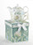 Blue Hydrangea Tea for one set in gift box, will brighten anyone's day with this beautiful tea for one gift set in its own matching print gift box with matching satin ribbon. A decorative tassel on the handle adds a lovely finishing touch. Gifting Idea: birthday gift, bridal shower, get well, thank you or treat yourself. Holds enough for a refill without leaving your comfy spot, desk or sip at beside for an evening nightcap.   Includes:  5.8" Tea for One Set in gift box Stacked teapot and oversized teacup Soft white background with a blue Hydrangea floral print Dishwasher safe  Other Items Available:  Tea choices available to add to your order in the loose-leaf shop   Teas and Teaware are shipped together, Cornucopia Teas come in resealable pouches with decorative tea labels, and includes a recipe and brewing guide. If purchasing as a gift your personal message is included on the pamphlet.