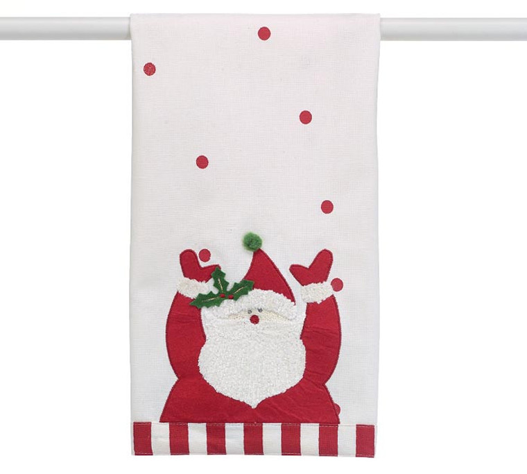 Tea Towel - Santa Claus: White tea towel with red polka dots and Santa with his hands up. His beard and cuffs are made of chenille yarn and body and holy trim is felt with a green pompom, a red and white stripe cloth band on the bottom edge. Body 100% cotton Applique 100% Polyester. by Burton and Burton