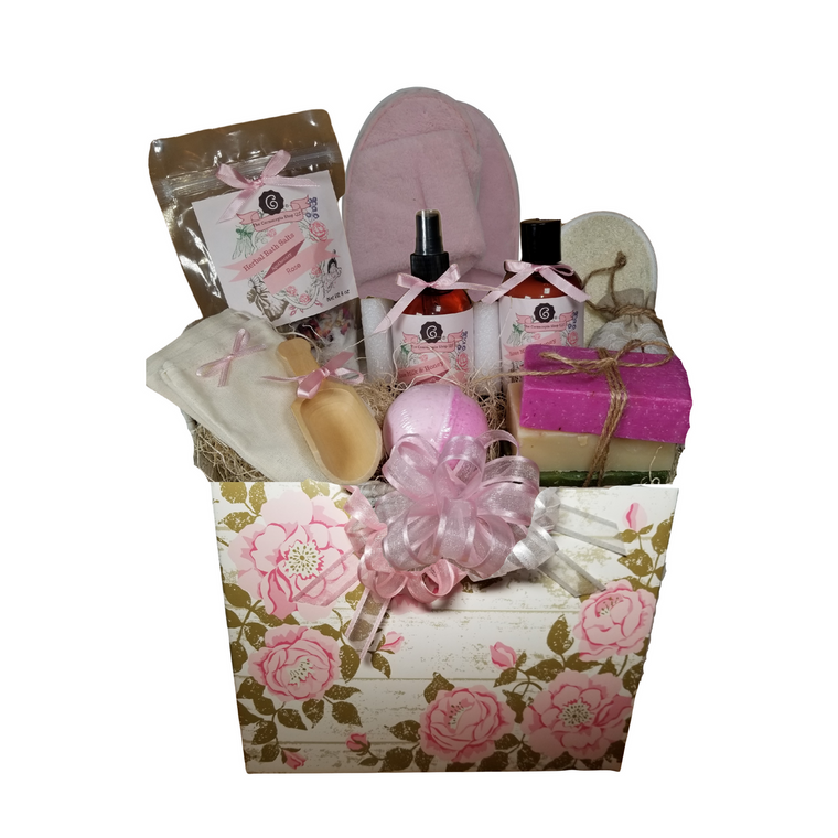Cottage Rose Garden - Spa Gift Basket Box, by The Cornucopia Shop LLC: Our Bath Soaks are made of the highest quality ingredients of botanicals, Teas, Essential Oils, Dead Sea Bath Salts, Epsom Bath Salts, & Pink Himalayan Salts. Aromatherapy to lift and rejuvenate the mind.  Our line includes Hand Crafted Cold Process Soaps, Body Lotions and Perfume Body Sprays, and Luxury Bath Bombs to sooth, soften and re-fresh. Dried Botanical Lingerie Sachet to scent a drawer.   Includes:  •	1- 4 oz Rose Bath Salts all-natural no dyes Super Rose origin Egypt  •	1- 8 oz Rose Milk & Honey Body Lotion •	1- 8 oz Rose Milk & Honey Body Spray •	1-.05 oz Super Lavender Drawer Sachet •	2- Linen Bath Tea Bags (re-usable) hand wash •	1- Ladies Slipper open toe, fits most •	1- Wooden Bath Salt Scoop  •	1- Loofah & Terry Cloth reversible Wash Pad with Wrist Band •	5 oz 2 1/2 “, Sugar Rose Bath Bomb •	3 Cold Process Bar Soaps,  o	English Garden o	Rocky Rose o	Moonlight & Roses Scrub Gift comes shrink wrapped in reusable Cottage Rose Garden gift basket box, pink paper sherd fill, decorative gift bow, and enclosure gift card. Key Ingredients: Bath Salt: Super Egyptian Rose Buds and petals, Epsom Salts, Rose Flower Essential Oil. Body lotion: Water, Blend of (Coconut Oil, Hempseed Oil, Sunflower Oil, Vitamin E, Mineral Oil), Propylene Glycol, Stearic Acid, Cetyl Alcohol, Phenoxyethanol, Ethylhexylglycerin, Glyceryl Stearate, Petrolatum, TEA 99%, Proprietary Fragrance and Essential Oil Blend, Dimethicone, Carbopol, Disodium EDTA, Allantoin, Aloe Vera Gel. Perfume Body Spray: Water, Polysorbate 20, Fragrance, DMDM Hydantoin, Disodium EDTA Cold Process Soaps: Olive Oil, Soybean Oil, Coconut Oil, Corn Oil. Sunflower Oil, Organic Shea Butter, Water. Sodium Hydroxide (Lye), Fragrance INCI: Olea Europaea (Olive) Oil, Glycine Soja (Soybean) Oil, Cocos Nucifera (Coconut) Oil, Zea Mays (Corn) Oil, Helianthus Annuus (Sunflower) Seed Oil, Butyrospermum Parkii (Shea Butter), Aqua, Sodium Hydroxide, Fragrance. May contain charcoal, FD&C color. Please note that due to the handmade nature of this soap, color shades and swirl styles may slightly vary. Each loaf and bar are unique!