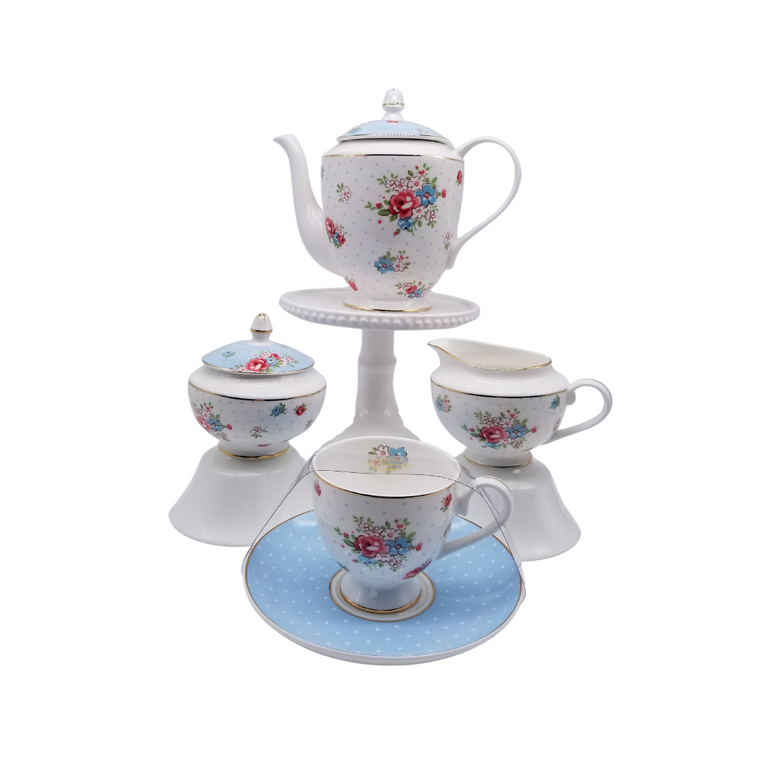 Katie Rose Blue Coffee/Tea Pot 11pc Set - Fine Bone China 11pc Coffee/Tea in fine bone china in a floral pattern with blue lids and gold trim.  Brite and cherry gatherings are sure to happen.    Gifting Idea: birthday, bridal shower, or Mother's Day.  Treat yourself or someone you love!   Includes:  11 pc Fine Bone China Coffee/tea set by Grace Teaware 1- 4 Cup Tea Pot, 30 ounces. Fine Bone China, Gold Trimmed 4 - cup/saucer set 1 - cream/sugar set Dishwasher safe   Complimentary Enclosure card included.
